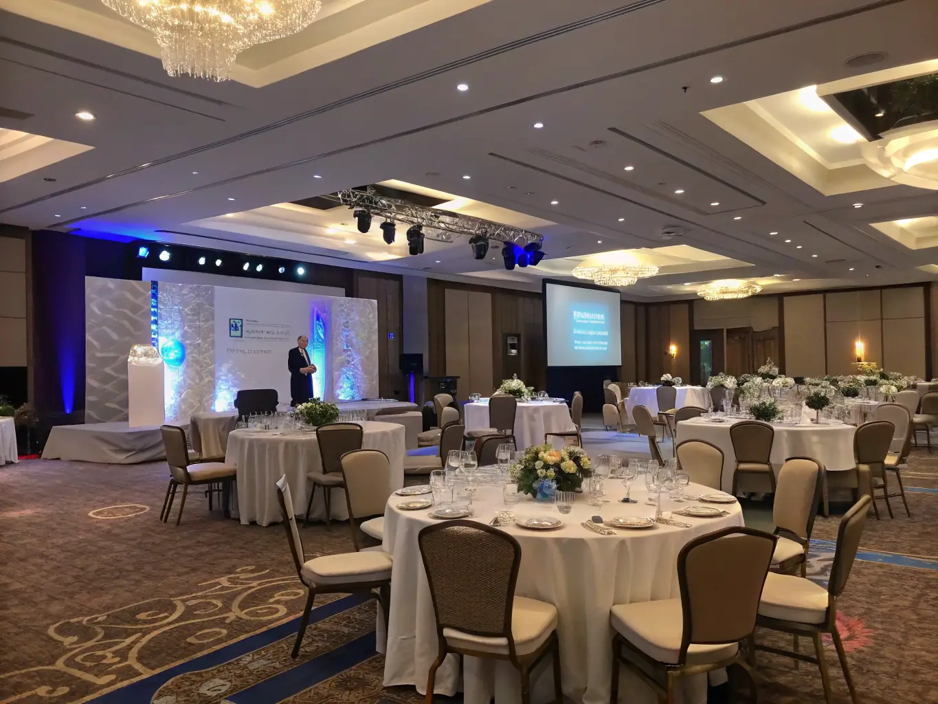 A photograph featuring a corporate event setup with stylish decorations and professional branding, illustrating Noble Event Designs' expertise in creating sophisticated corporate functions.
